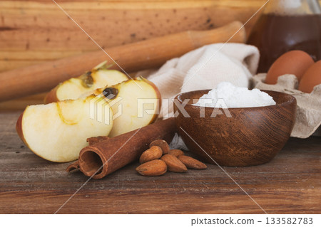 Fresh baking ingredients on rustic wooden table . Space fot text. Home cooking concept 133582783