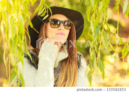 Adorable woman in sunglasses Adorable woman in sunglasses 133582853