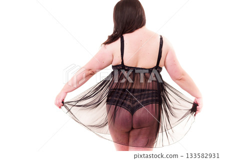 Fat woman in lingerie back view. Fat woman in lingerie back view. 133582931