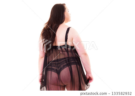 Fat woman in lingerie back view. 133582932