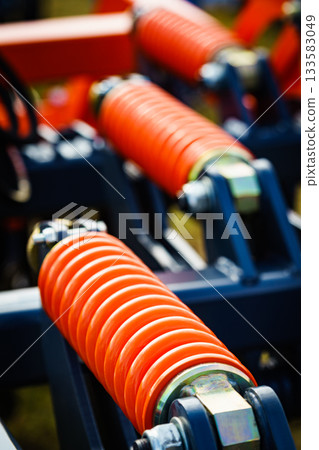 Industrial spring at agricultural machine Industrial spring at agricultural machine 133583049