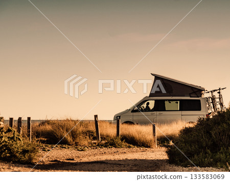 Camper van with roof top tent camp on beach Camper van with roof top tent camp on beach 133583069