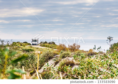 Camper on cliff, coast in Spain Camper on cliff, coast in Spain 133583090