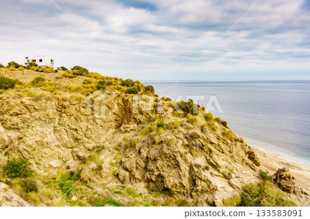 Camper on cliff, coast in Spain Camper on cliff, coast in Spain 133583091