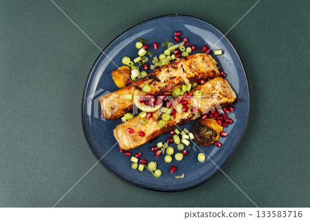 Fried salmon pieces, healthy nutrition. Fried salmon pieces, healthy nutrition. 133583716