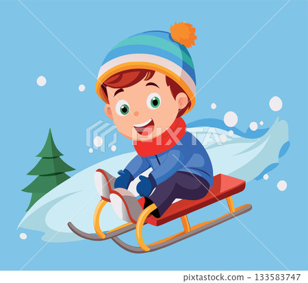 Happy boy sledding downhill having fun in winter 133583747