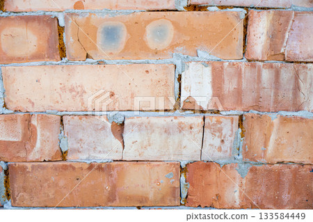 Clay red brick close-uo macro texture. Construction brick isolate on white Clay red brick close-uo macro texture. Construction brick isolate on white 133584449