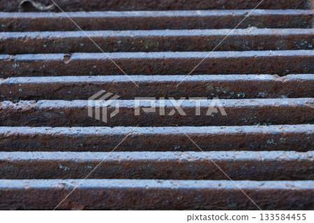 Holes rubber door mat for wiping foot with round holes texture asbtraction Holes rubber door mat for wiping foot with round holes texture asbtraction 133584455