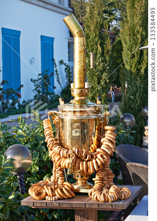Russian samovar with bagels and drying Russian samovar with bagels and drying 133584495
