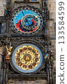 Prague, czech republic, august 9, 2023. Prague astronomical clock face with complex mechanisms, depicting zodiac signs, seasons, and christian calendar 133584599