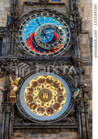 Prague, czech republic, august 9, 2023. Prague astronomical clock face with complex mechanisms, depicting zodiac signs, seasons, and christian calendar Prague, czech republic, august 9, 2023. Prague astronomical clock face with complex mechanisms, depicting zodiac signs, seasons, and christian calendar 133584599