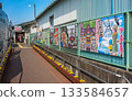 [Saitama, Chichibu] A colorful illustrated poster promoting tourism has been installed at Onohata Station. 133584657