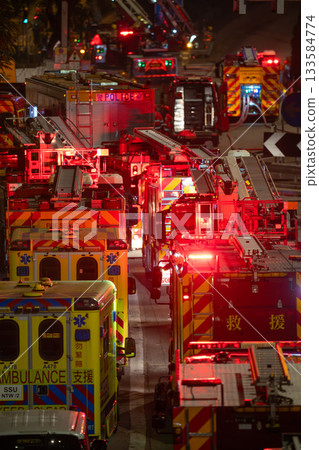 Ambulances at Hong Kong Tai Po apartment fire  133584774