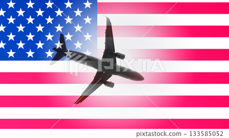 A plane is flying over the American flag A plane is flying over the American flag 133585052