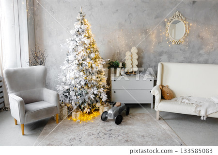 White Christmas tree decorating cozy living room interior White Christmas tree decorating cozy living room interior 133585083
