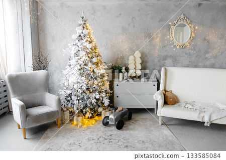 White Christmas tree decorating cozy living room interior White Christmas tree decorating cozy living room interior 133585084