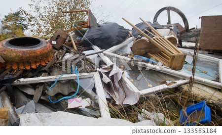 collection of construction waste including roofing and metal drums available now, wide assortment of construction debris like roofing sheets and metal drums prepared for transfer 133585184