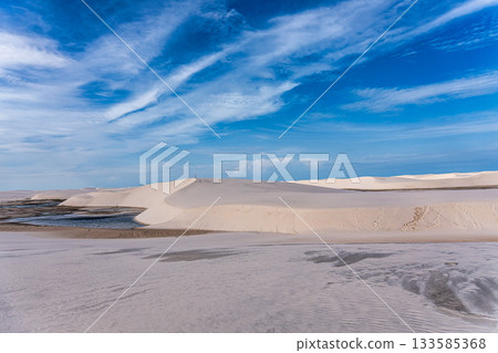 Dunes and lagoons of lagoa bonita, Lencois Maranhenses, Barreirinhas, Brazil. White sand dunes with pools of fresh water Dunes and lagoons of lagoa bonita, Lencois Maranhenses, Barreirinhas, Brazil. White sand dunes with pools of fresh water 133585368