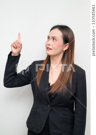 Asian Business Woman Pointing Finger Studio Portrait on White Background Asian Business Woman Pointing Finger Studio Portrait on White Background 133585661