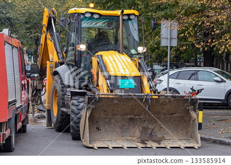 Construction site on urban street Construction site on urban street 133585914