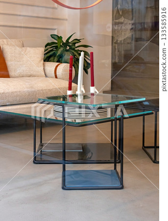 Decorative glass table in modern interior Decorative glass table in modern interior 133585916