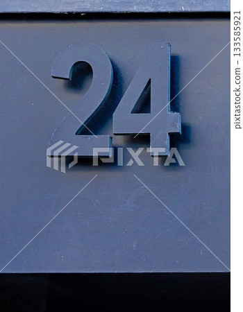Number 24 on modern building facade Number 24 on modern building facade 133585921