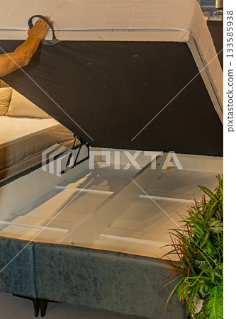 Open bed with empty storage space 133585938