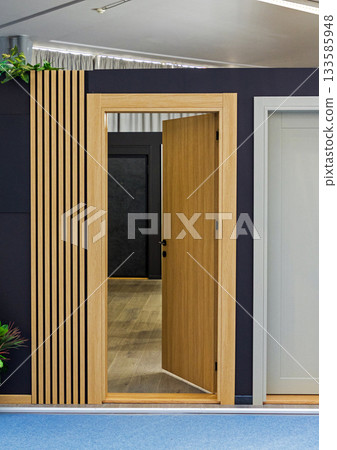 Open door in corridor interior Open door in corridor interior 133585948