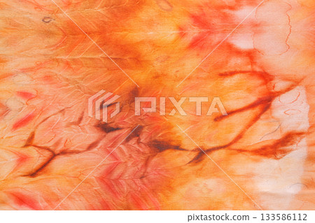 abstract pattern on silk fabric texture in yellow and brown tones 133586112
