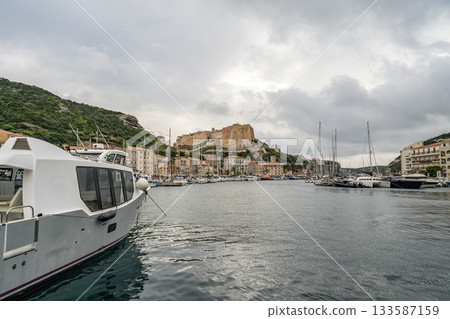 Aerial view marina cape Bonifacio south Corsica France citadel on rocky promontory on wild white limestone cliffs Aerial view marina cape Bonifacio south Corsica France citadel on rocky promontory on wild white limestone cliffs 133587159