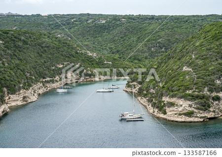 Aerial view marina cape Bonifacio south Corsica France citadel on rocky promontory on wild white limestone cliffs Aerial view marina cape Bonifacio south Corsica France citadel on rocky promontory on wild white limestone cliffs 133587166