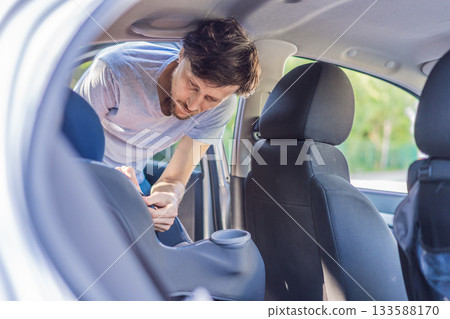 Man cleaning the interior of his car, wiping surfaces and organizing the vehicle, concept of cleanliness, maintenance and everyday routine Man cleaning the interior of his car, wiping surfaces and organizing the vehicle, concept of cleanliness, maintenance and everyday routine 133588170