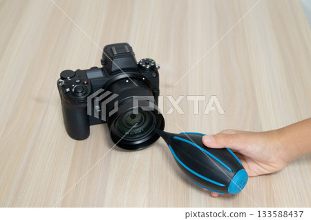 Clean the camera body and lens with a blower 133588437