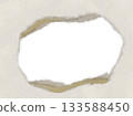 Torn and holey paper background material cardboard 133588450