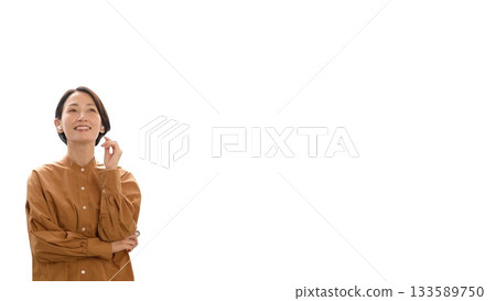 Woman listening to music or the radio with earphones (center) 133589750