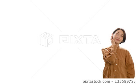 Woman listening to music or the radio with earphones (center) Woman listening to music or the radio with earphones (center) 133589753