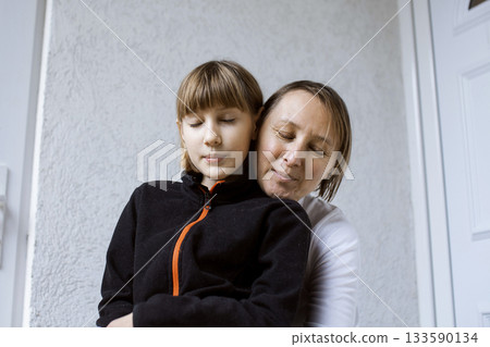 mother with daughter hugging, lifestyle people concept mother with daughter hugging, lifestyle people concept 133590134