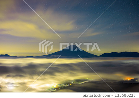 A sea of clouds and Mount Fuji seen from the Kushigatakeyama forest road at midnight A sea of clouds and Mount Fuji seen from the Kushigatakeyama forest road at midnight 133590225