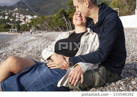 young caucasian couple tourists having fun on sea side, lifestyle people concept 133590392