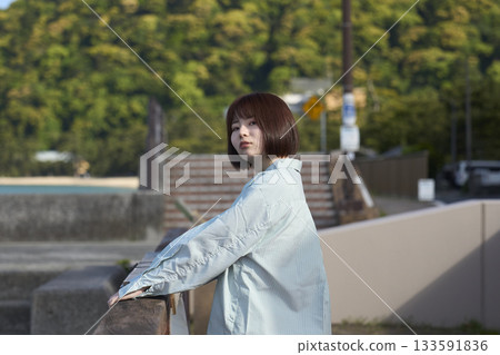 Woman looking at the lake 133591836