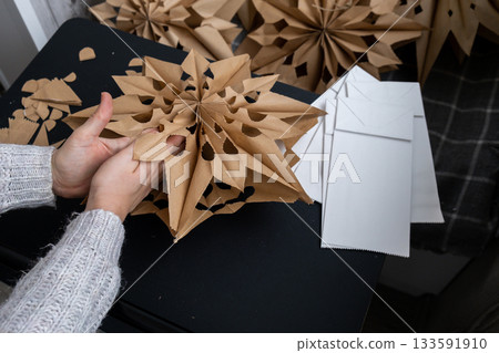 Sustainableminded Christmas cozy home handmade decoration. Tutorial for making do it yourself craft paper lunch bags and hot glue. Seasonal activity for kids. 3D snowflakes eve preparation Sustainableminded Christmas cozy home handmade decoration. Tutorial for making do it yourself craft paper lunch bags and hot glue. Seasonal activity for kids. 3D snowflakes eve preparation 133591910