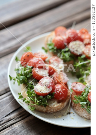 Cherry Tomato and Sprout Baguette Open Sandwich 133592127