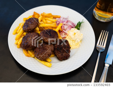 Ustipci are a fried dough pastry similar to donuts. They are popular in Bosnia and Herzegovina, Croatia, North Macedonia, Serbia 133592403