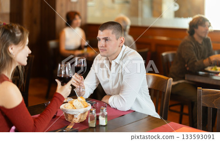 Young couple having dinner at restaurant 133593091