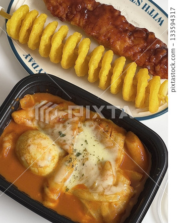 Bunsik, a popular Korean street food, includes various dishes like tteokbokki, odeng, and gimbap. It's a tasty, comforting snack loved by many, perfect for casual gatherings or quick bites. Bunsik, a popular Korean street food, includes various dishes like tteokbokki, odeng, and gimbap. It's a tasty, comforting snack loved by many, perfect for casual gatherings or quick bites. 133594317