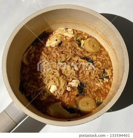Shin Ramyun,close up of Ramyeon or Ramyun is a Korean-style soup noodle dish with a spicy flavor. Ramyeon or Korean instant noodles with egg - Korean food style 133594401