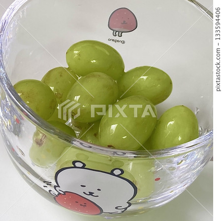 Fresh Shine Muscat grapes, known for their crisp texture and sweet, refreshing taste. Perfect for showcasing premium fruit, ideal for food photography, healthy eating concepts, and gourmet projects. Fresh Shine Muscat grapes, known for their crisp texture and sweet, refreshing taste. Perfect for showcasing premium fruit, ideal for food photography, healthy eating concepts, and gourmet projects. 133594406