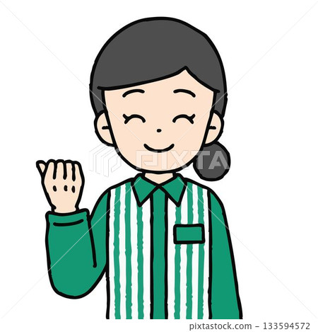 A female convenience store clerk is doing a fist pump 133594572