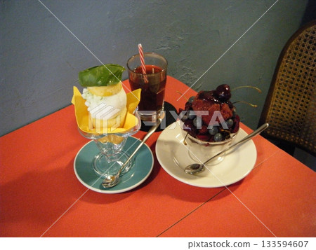 Light and creamy desserts with delicate layers, fresh fruits, and rich flavors, paired with refreshing sweet drinks. A perfect café treat for a delightful and indulgent experience. Light and creamy desserts with delicate layers, fresh fruits, and rich flavors, paired with refreshing sweet drinks. A perfect café treat for a delightful and indulgent experience. 133594607