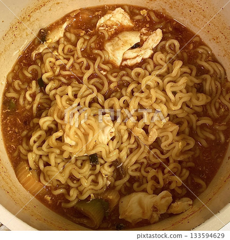Shin Ramyun,close up of Ramyeon or Ramyun is a Korean-style soup noodle dish with a spicy flavor. Ramyeon or Korean instant noodles with egg - Korean food style Shin Ramyun,close up of Ramyeon or Ramyun is a Korean-style soup noodle dish with a spicy flavor. Ramyeon or Korean instant noodles with egg - Korean food style 133594629